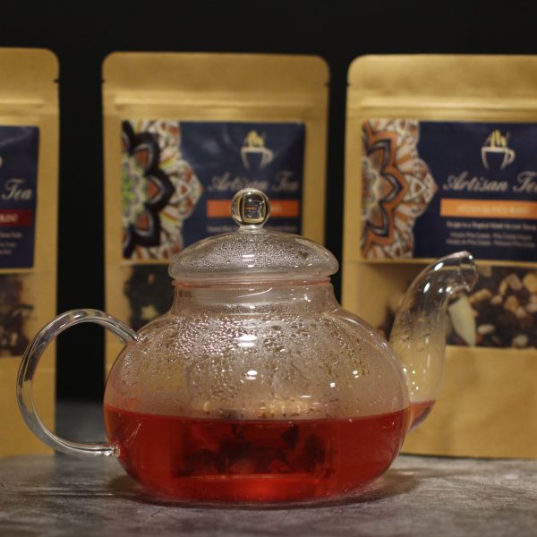 Théière en verre avec infuseur forme perle 400 ml, vue de profil, bec à gauche