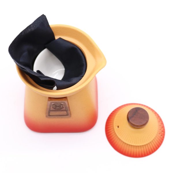 Service à thé trois tasses – terre orangée, détail du couvercle et de l’anse