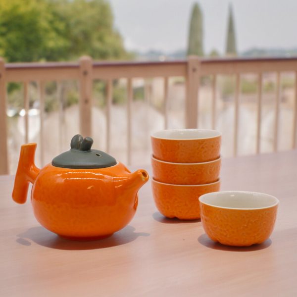 Service à thé théière et quatre tasses, contenu du coffret