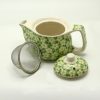 Petite théière à tisane marguerite verte — Céramique et métal, vue d’ensemble